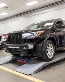 Toyota on vehicle lift | Matick Toyota in Macomb Township MI