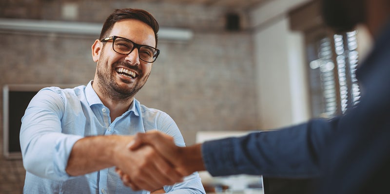 Customer shaking hands with a sales representative - Matick Toyota in Macomb Township MI