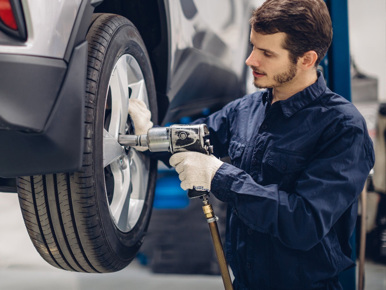 Mechanic working on tire alignment - Matick Toyota in Macomb Township MI
